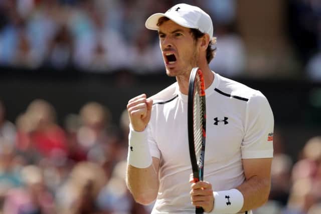 Andy Murray celebrates during the men's singles final against Milos Raonic. Picture: PA.
