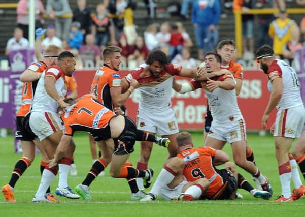 Tempers flare between the Castleford and Catalans plyers during Tigers' 38-24 win.