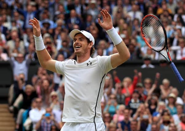 Andy Murray drops his racket after the final point in his victory over Milos Raonic (Picture: Adam Davy/PA Wire).