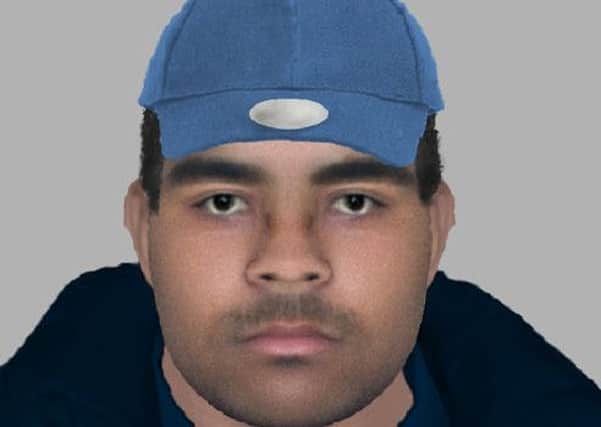 An e-fit image of one of the robbers being sought by police.