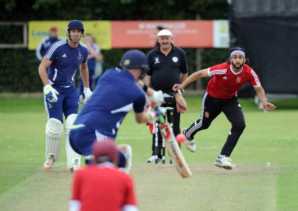 Bradford League T20 Final Day at Pudsey St Lawrence: 
Sohali Raz beats the bat for Methley in the semi-final against Hanging Heaton. He took 4-10 for  the day's best bowling figures. PIC: Steve Riding