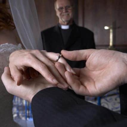 A Generic Photo of a vicar marrying a couple in a church. See PA Feature TOPICAL Weddings. Picture credit should read: PA Photo/Thinkstockphotos. WARNING: This picture must only be used to accompany PA Feature TOPICAL Weddings.