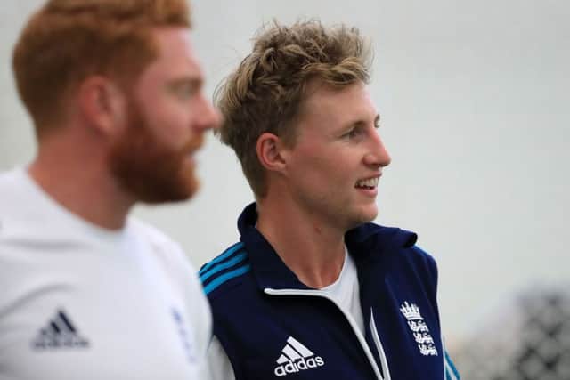 Joe Root, right, with Yorkshire and England team-mate, Jonny Bairstow, during a net session at Lord's yesterday. Picture: John Walton/PA.