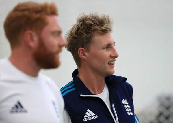 Joe Root, right, with Yorkshire and England team-mate, Jonny Bairstow, during a net session at Lord's yesterday. Picture: John Walton/PA.