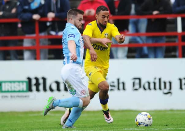 Leeds United's Kemar Roofe takes on Shelbourne's Lorcan Shannon.
 Picture: Jonathan Gawthorpe.
