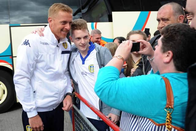 Manager Garry Monk poses for photos with Leeds fans.