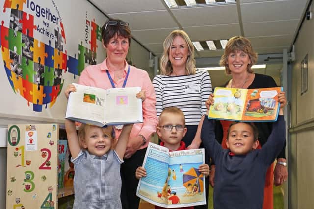 THANKS: From left, Sarah Latham, deputy head, Sarah Aspin and Ruth Peel with pupils.