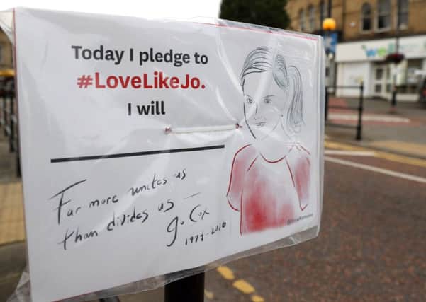Posters have appeared around Batley ahead of the funeral of Labour MP Jo Cox, bearing the legend: "Today I pledge to #LoveLikeJo."