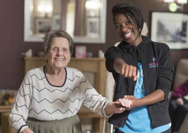 Nouveau Wellbeing instructor Sophie Simpson (right) pictured during a fitness class at Beech Hall Care Home in Armley.