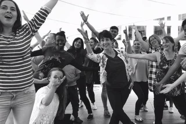 DANCE JOY: Beverly (second, right) taking part in the flashmob event in London.