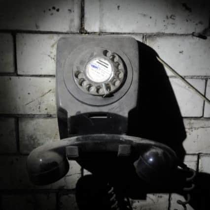 28 September 2011  ..........  An old telephone in the old railway station underneath the present Leeds City station.