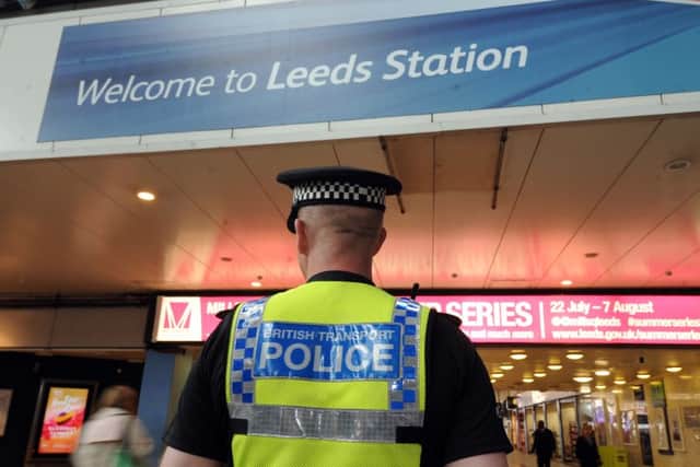 An officer on patrol at the station, which is the busiest in the UK. Picture by Simon Hulme