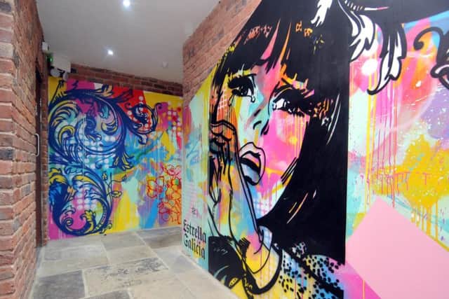 Graffiti art adorns the walls in the corridors at 53 Degrees North.