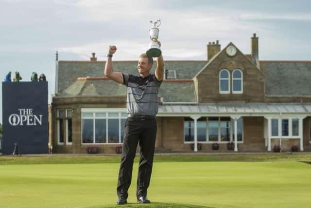 HISTORY BOY: Henrik Stenson celebrates winning the Open with a record score. But how many got to see it?