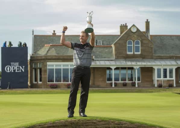 HISTORY BOY: Henrik Stenson celebrates winning the Open with a record score. But how many got to see it?