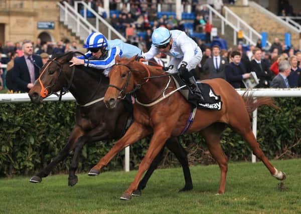 FAMILIAR FACES: YP columnist Daniel Tudhope is reunited with First Bombardment  the pair seen in action above left, at Doncaster last year  for todays Festival Stakes Handicap at York . Picture: Nick Potts/PA.