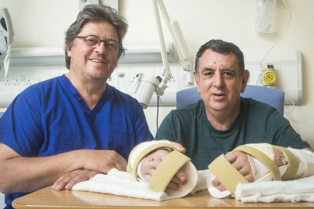 Consultant plastic surgeon Professor Simon Kay with Chris King