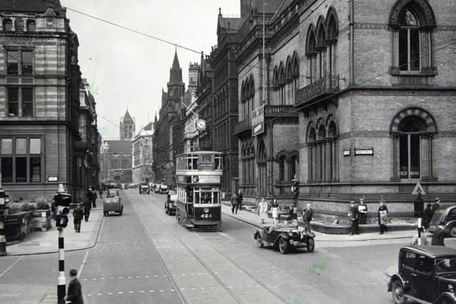 The traffic lights at Bond Street and Park Row, Leeds, the first of their kind in the country were installed in 1928. Park Row looking towards the Headrow.