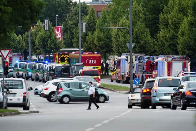 The scene outside the shopping centre in Munich (AP Photo/APTV)