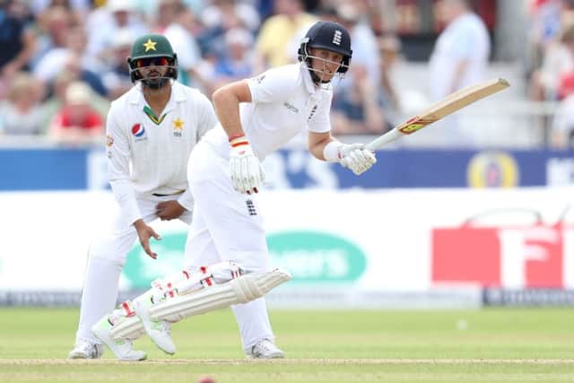 England's Joe Root hits out against Pakistan on his way to an unbeaten 141 at Old Trafford on day two of the second Test match. Picture: Martin Rickett/PA.
