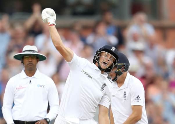 England's Joe Root celebrates making his century against Pakistan (Picture: Martin Rickett/PA Wire).