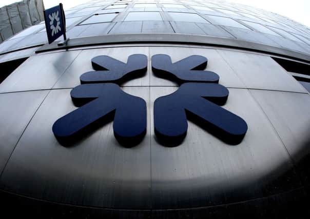 The RBS logo outside a branch of the Royal Bank of Scotland.