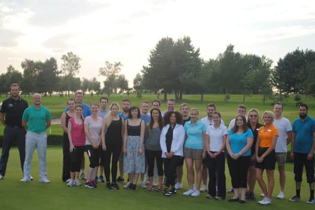 Some of the Up to Scratch Challenge pupils with staff from the Leeds Golf Centre.