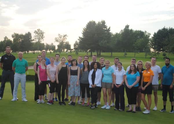 Some of the Up to Scratch Challenge pupils with staff from the Leeds Golf Centre.