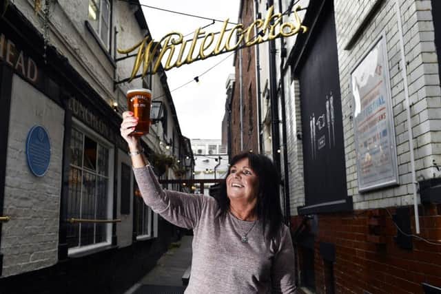 Barmaid of 33 years Kim Shires gets ready for the Whitelock's Beer Festival. Pictures: Jonathan Gawthorpe.