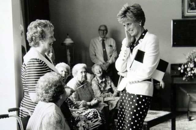 Princess Diana enjoys a joke with day care visitors at St Gemma's Hospice in Moortown, September 18, 1991.