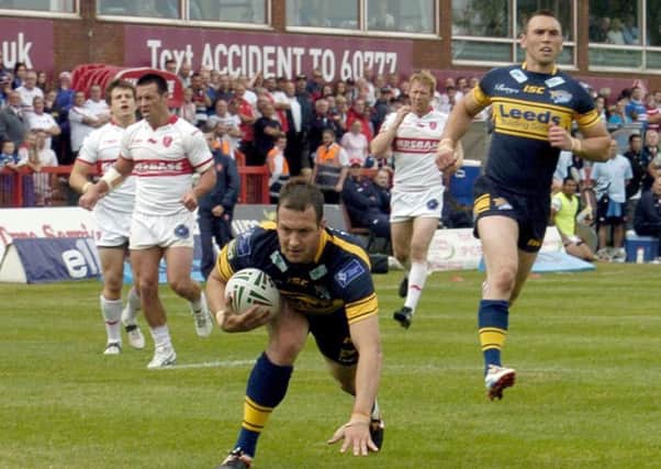 Danny McGuire scores against Hull KR in 2012.