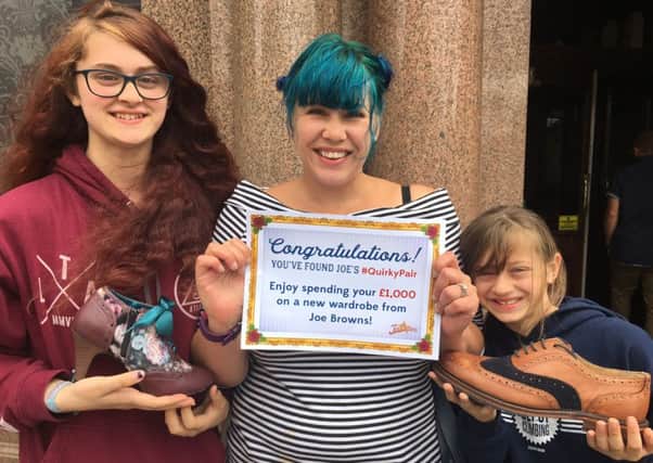 Kellie Dawson (centre), 40, and her daughters Georgia, 15 and Scarlett, 10, after finding the #quirkypair.