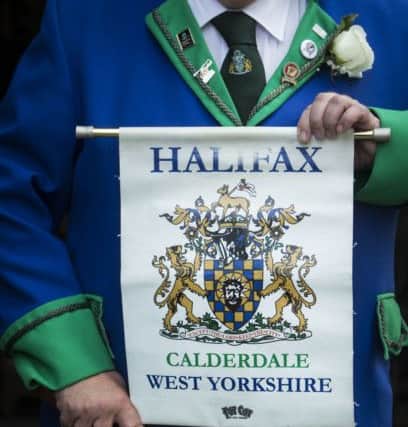 A town crier and a parade of Lord Mayors, Mayors and other Civic Heads from across Yorkshire make their way through Halifax during the Yorkshire Day Celebrations.