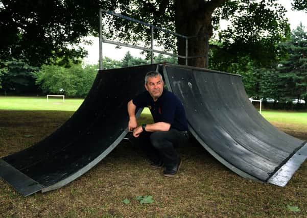 Horsforth Hall Park Cricket Club committee member Rob Hodson beside the damaged skate ramp. Picture : Jonathan Gawthorpe