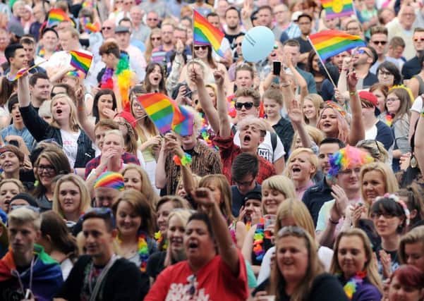 The crowds at last year's Leeds Pride get in the party spirit.
Picture: Jonathan Gawthorpe.