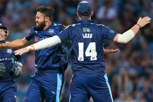 Yorkshire's Azeem Rafiq and Alex Lees celebrate another wicket in the T20 campaign.