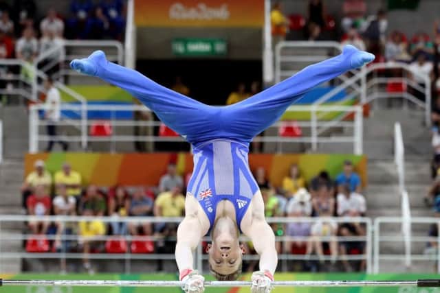 Great Britain's Nile Wilson, of Leeds, during the men's individual all-round qualification gymnastics