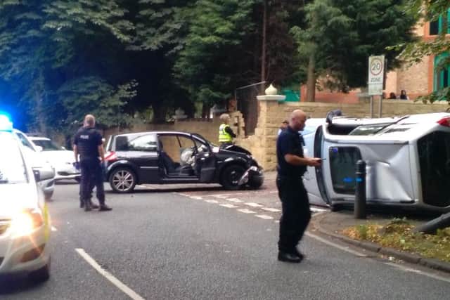 The black Renault Megane was being pursued by police when it crashed into the silver Subaru Forrester.