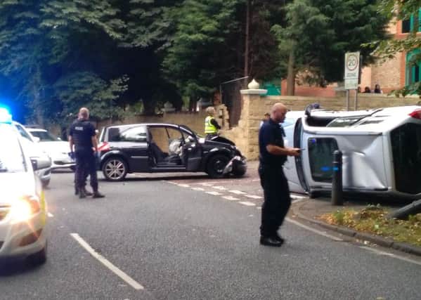 The black Renault Megane was being pursued by police when it crashed into the silver Subaru Forrester.