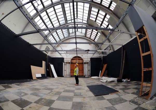 Audience Development Officer for 
Leeds Art Gallery Lizzy Wilson views the uncovered ceiling at Leeds Art Gallery. 
9th August 2016