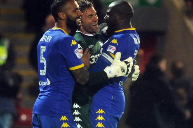 Spot stopper Rob Green celebrates with Kyle Bartley and Sol Bamba.  PIC: Tony Johnson