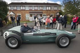 Barrie Williams at the wheel of  an Aston Martin DBR4 Formula One racing car at the September 2015 celebration event in Farsley