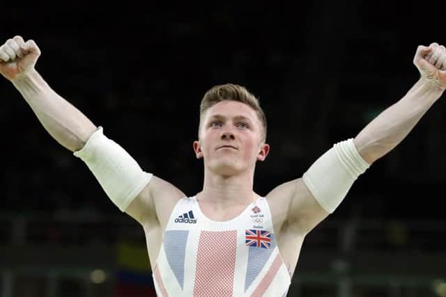 Nil Wilson lands a perfect dismount (PA)