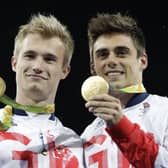 City of Leeds divers Jack Laugher (left) and Chris Mears pose with their gold medals after the men's synchronized 3-meter springboard diving final.