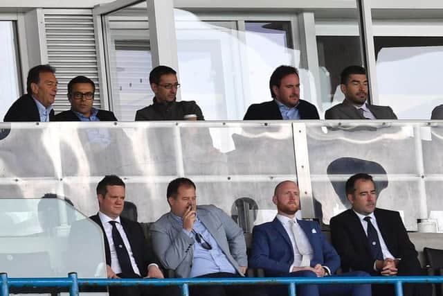 Massimo Cellino and Andrea Radrizzani (back row, far left) sat next to each other during Leeds United's pre-season friendly against Atalanta at Elland Road.