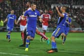 Chris Wood celebrates his goal at Fleetwood with Kemar Roofe.