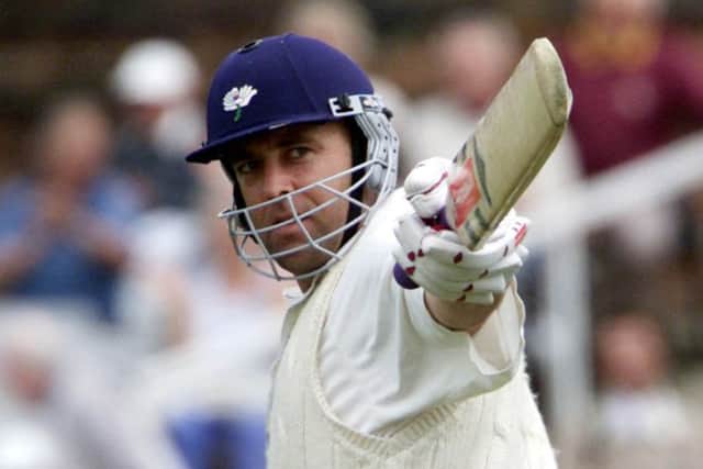 Yorkshire's Darren Lehmann celebrates a century during his playing days with the county.