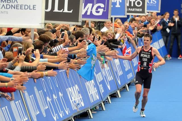 Jonny Brownlee greets the crowd at the end of the Columbia Threadneedle World Triathlon Leeds. Picture by Tony Johnson.