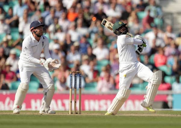 Pakistan's Azhar Ali hits a six for the winning runs at The Oval against England to square the four-match series. Picture: Adam Davy/PA.
