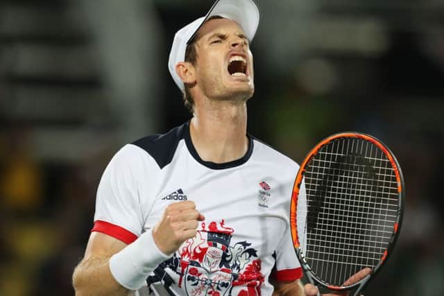 Great Britain's Andy Murray celebrates a point against Argentina's Juan MartÃn del Potro in the men's singles final. Picture: Owen Humphreys/PA